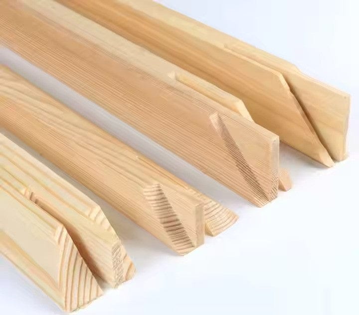 Wooden stakes with a textured surface on a white background