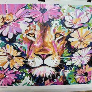 Colorful artwork of a tiger surrounded by flowers on a white background