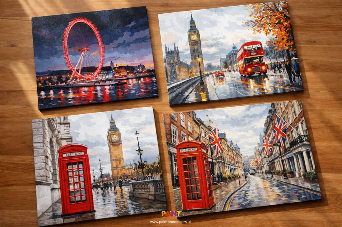 Four London paint by numbers kits showing the iconic London Eye, Big Ben, red telephone box, and Union Jack street scene designs on linen canvas
