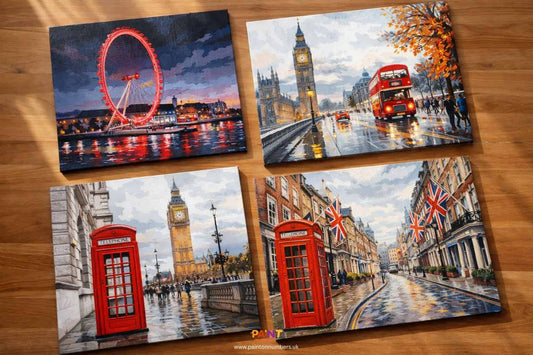 Four London paint by numbers kits showing the iconic London Eye, Big Ben, red telephone box, and Union Jack street scene designs on linen canvas