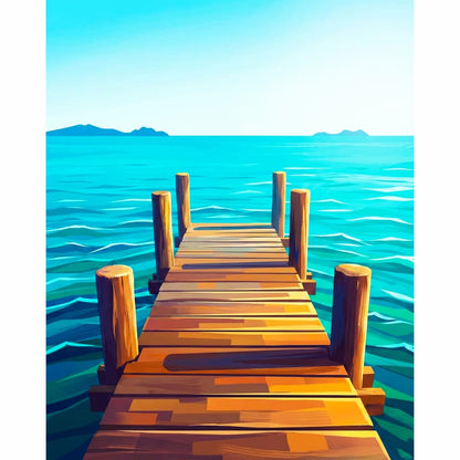 Wooden dock extending into a blue ocean with mountains in the background