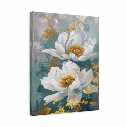 A vertical canvas wall art print featuring two large white flowers with textured gold centers against a muted teal and gray background with gold paint splatters.