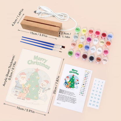 Christmas acrylic paint kit with a wooden block, white power cord, four blue paintbrushes, multiple small paint pots, an acrylic sheet with a Santa and Christmas tree illustration, an instruction sheet, and a numbered sticker sheet on a light beige background.
