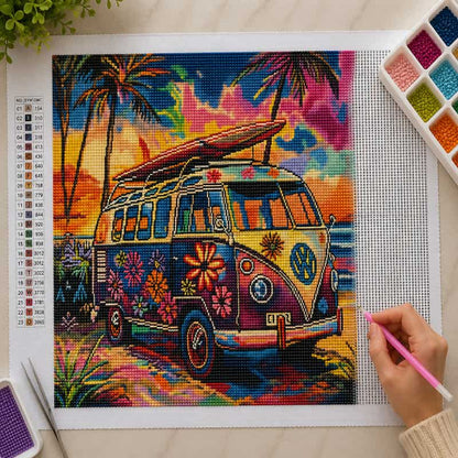 Colorful diamond painting of a van with palm trees and flowers on a grid paper.