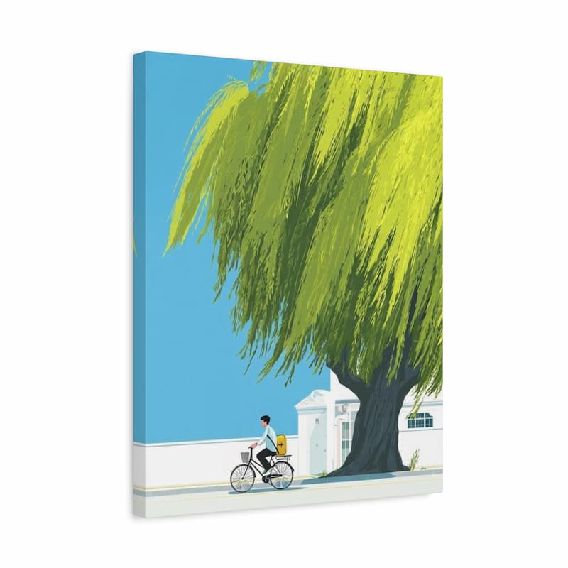 A vertical canvas wall art print featuring a stylized illustration of a large green weeping tree beside a blue sky, white building, and a small cyclist.