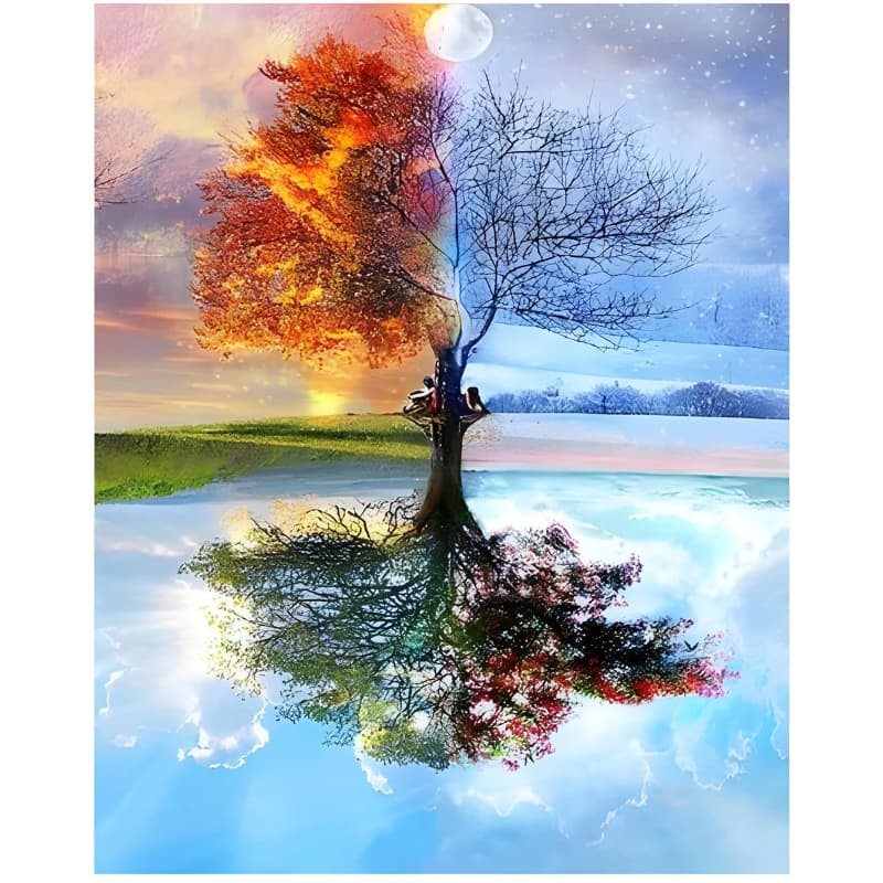 Tree with colorful foliage reflected in water, with a person sitting under it.