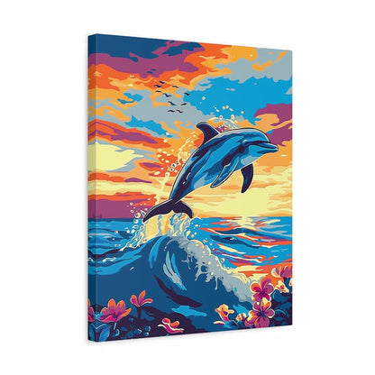 Canvas print with a dolphin leaping over waves against a colorful sky.
