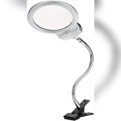 Flexi arm magnifying lamp with clip on a white background
