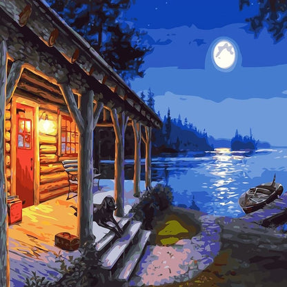 Log cabin by a lake at night with a full moon
